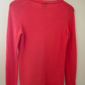 100% cashmere vibrant orange sweater